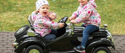 little-baby-girls-playing-with-car